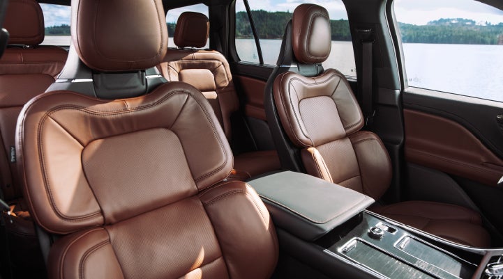 The front row's Perfect Position Seats in a 2024 Lincoln Aviator® Reserve model with Ebony Roast interior | Dave Sinclair Lincoln in St Louis MO