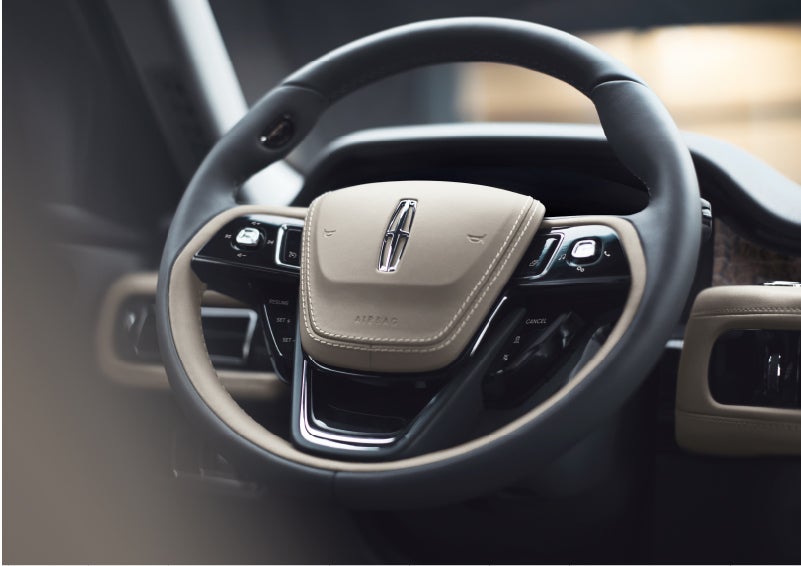 The intuitively placed controls of the steering wheel on a 2023 Lincoln Aviator® SUV | Dave Sinclair Lincoln in St Louis MO