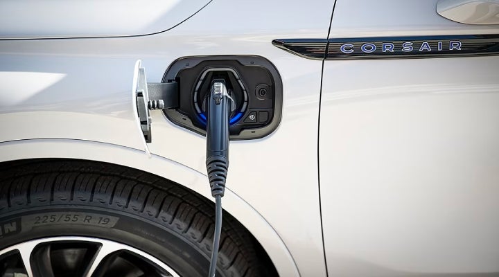 An electric charger is shown plugged into the charging port of a Lincoln Corsair® Grand Touring
model. | Dave Sinclair Lincoln in St Louis MO