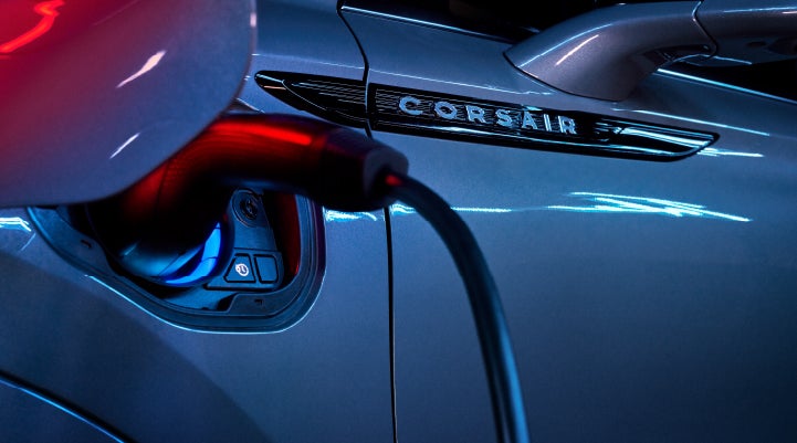 A charger plugged into the charging port of a 2024 Lincoln Corsair® Plug-in Hybrid model. | Dave Sinclair Lincoln in St Louis MO